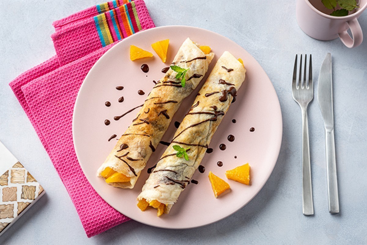 Crepes con arance, cioccolato e cannella