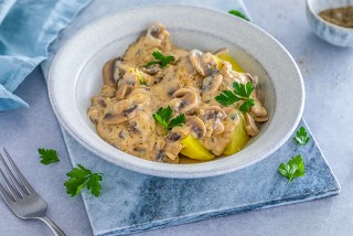 Aardappelen met romige champignonsaus